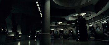 Movie still from “Live Free or Die Hard” (2007), directed by Len Wiseman – A group of vending machines inside a building; Extreme Wide shot, High angle