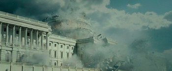 Movie still from “Live Free or Die Hard” (2007), directed by Len Wiseman – A building that has been destroyed by a fire; Extreme Wide shot, Low angle