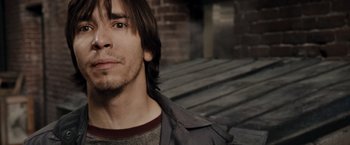 Movie still from “Live Free or Die Hard” (2007), directed by Len Wiseman – A person with long hair; Close Up shot, Over the shoulder angle