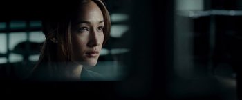 Movie still from “Live Free or Die Hard” (2007), directed by Len Wiseman – A person looking at the camera; Close Up shot, Over the shoulder angle