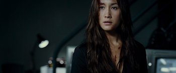 Movie still from “Live Free or Die Hard” (2007), directed by Len Wiseman – A young woman with blood all over her face; Close Up shot, Over the shoulder angle