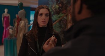 Movie still from “Locked Down” (2021), directed by Doug Liman – A woman in a black jacket is looking at a man in a black jacket; Close Up shot, Over the shoulder angle
