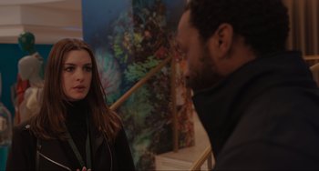 Movie still from “Locked Down” (2021), directed by Doug Liman – A man and a woman are looking at each other; Medium shot, Over the shoulder angle