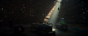 Movie still from “Logan” (2017), directed by James Mangold – A living room filled with furniture and a large window; Extreme Wide shot, Low angle