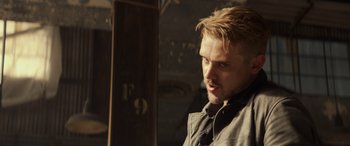 Movie still from “Logan” (2017), directed by James Mangold – A person wearing a tie; Close Up shot, Over the shoulder angle