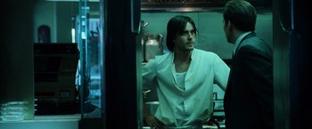 Movie still from “Lord of War” (2005), directed by Andrew Niccol – Jared leto in a kitchen with a pot on the counter; Medium shot, Over the shoulder angle