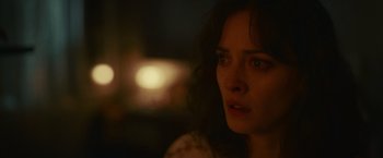 Movie still from “Lost Bullet 2: Back for More” (2022), directed by Guillaume Pierret – A person looking at the camera; Close Up shot, Over the shoulder angle
