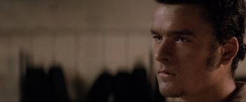 Movie still from “Lost Highway” (1997), directed by David Lynch – A man's face in the dark; Close Up shot, Low angle