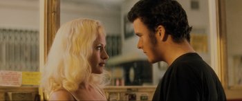 Movie still from “Lost Highway” (1997), directed by David Lynch – A man and a woman looking at one another; Close Up shot, Over the shoulder angle