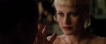 Movie still from “Lost Highway” (1997), directed by David Lynch – A person with blond hair; Close Up shot, Over the shoulder angle