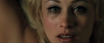 Movie still from “Lost Highway” (1997), directed by David Lynch – A woman's eyes and lips; Extreme Close Up shot, Overhead angle