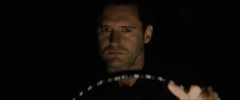 Movie still from “Lost Highway” (1997), directed by David Lynch – A person in a dark room; Close Up shot, Low angle