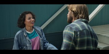 Movie still from “Lou” (2022), directed by Anna Foerster – A man and a woman talking to each other; Medium shot, Over the shoulder angle