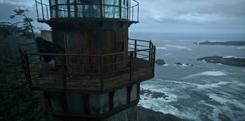 Movie still from “Lou” (2022), directed by Anna Foerster – A view of the ocean from the top of a light house; Extreme Wide shot, High angle