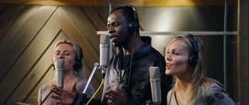 Movie still from “Love Actually” (2003), directed by Richard Curtis – Medium shot, Low angle