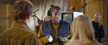 Movie still from “Love Actually” (2003), directed by Richard Curtis – Medium shot, Over the shoulder angle