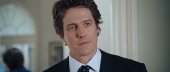 Movie still from “Love Actually” (2003), directed by Richard Curtis – Close Up shot, Over the shoulder angle