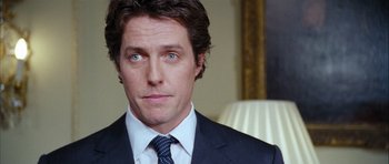 Movie still from “Love Actually” (2003), directed by Richard Curtis – Close Up shot, Over the shoulder angle