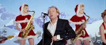 Movie still from “Love Actually” (2003), directed by Richard Curtis – Medium shot, Low angle