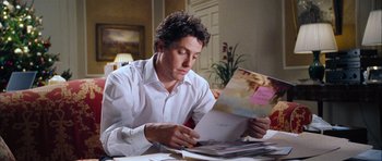 Movie still from “Love Actually” (2003), directed by Richard Curtis – Medium shot, Over the shoulder angle