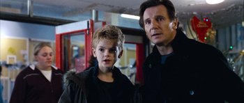 Movie still from “Love Actually” (2003), directed by Richard Curtis – Close Up shot, Over the shoulder angle