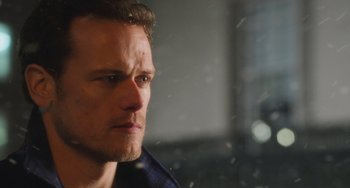 Movie still from “Love Again” (2023), directed by Jim Strouse – A man's face in front of a window; Close Up shot, Over the shoulder angle