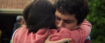 A man and a woman hugging each other