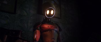 Movie still from “Love and Monsters” (2020), directed by Michael Matthews – The face of an iron man robot; Close Up shot, Low angle