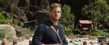 Movie still from “Love and Monsters” (2020), directed by Michael Matthews – A person wearing a sweater; Close Up shot, Over the shoulder angle