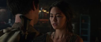 Movie still from “Love and Monsters” (2020), directed by Michael Matthews – A young man and a young woman are looking at each other; Close Up shot, Over the shoulder angle