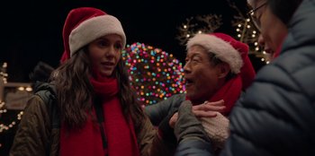 Movie still from “Love Hard” (2021), directed by Hernán Jiménez – A man and a woman wearing santa hats; Close Up shot, Over the shoulder angle
