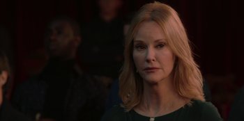 Movie still from “Love Hard” (2021), directed by Hernán Jiménez – A person with long blonde hair; Close Up shot, Over the shoulder angle