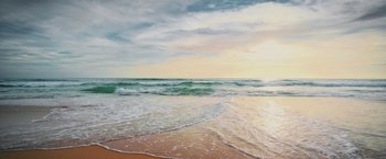 Movie still from “Love in Taipei” (2023), directed by Arvin Chen – A painting of the ocean and the sky at sunset; Extreme Wide shot, High angle