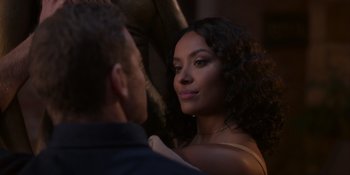 Movie still from “Love in the Villa” (2022), directed by Mark Steven Johnson – A man and a woman are looking at one another; Close Up shot, Over the shoulder angle