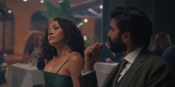 Movie still from “Love in the Villa” (2022), directed by Mark Steven Johnson – A man and a woman are standing next to each other; Medium shot, Over the shoulder angle