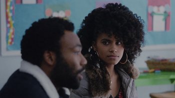 Movie still from “Atlanta” (2016), created by Donald Glover – A man and a woman sitting next to each other in a room; Close Up shot, Over the shoulder angle