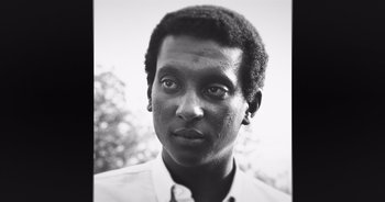 A black and white photo of a man's face