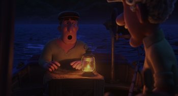 Movie still from “Luca” (2021), directed by Enrico Casarosa – An animated character sitting at a table next to a lantern; Medium shot, High angle