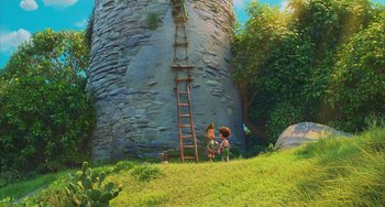Movie still from “Luca” (2021), directed by Enrico Casarosa – Two children are standing in front of a large stone tower; Extreme Wide shot, Low angle