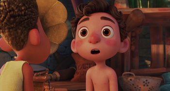Movie still from “Luca” (2021), directed by Enrico Casarosa – A cartoon of a boy looking surprised at another cartoon; Close Up shot, Over the shoulder angle