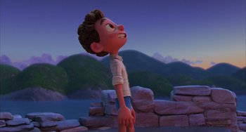 Movie still from “Luca” (2021), directed by Enrico Casarosa – A cartoon of a boy looking up at the sky; Medium shot, Low angle