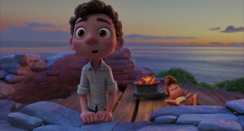 Movie still from “Luca” (2021), directed by Enrico Casarosa – An animated scene of a young boy and a little girl; Medium shot, Over the shoulder angle
