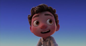 Movie still from “Luca” (2021), directed by Enrico Casarosa – A cartoon of a boy with brown eyes and brown hair; Close Up shot, Low angle