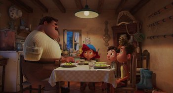 Movie still from “Luca” (2021), directed by Enrico Casarosa – A group of people sitting around a table eating food; Wide shot, High angle