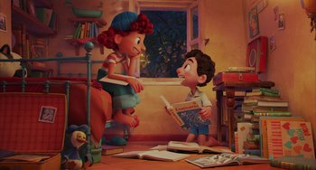 Movie still from “Luca” (2021), directed by Enrico Casarosa – A boy and a girl are sitting in front of a window; Wide shot, High angle