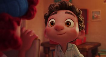 Movie still from “Luca” (2021), directed by Enrico Casarosa – A character's face in a movie; Close Up shot, Over the shoulder angle