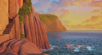 Movie still from “Luca” (2021), directed by Enrico Casarosa – A painting of the ocean and a cliff with trees on it; Extreme Wide shot, Low angle