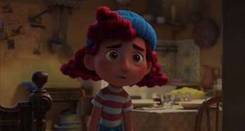 Movie still from “Luca” (2021), directed by Enrico Casarosa – A girl with red curly hair wearing a blue hat; Close Up shot, Over the shoulder angle