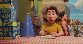 Movie still from “Luca” (2021), directed by Enrico Casarosa – A woman sitting at a table writing on a piece of paper; Medium shot, Over the shoulder angle