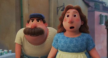 Movie still from “Luca” (2021), directed by Enrico Casarosa – A man and a woman standing next to each other; Close Up shot, Low angle